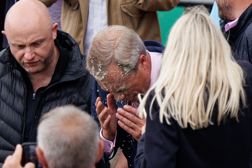 Reform UK leader Nigel Farage after he was hit by a milkshake during a campaign event in Clacton-on-Sea, Essex, on Tuesday. Photo: EPA-EFE