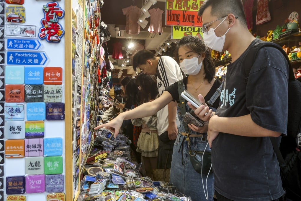 Customers choose souvenirs at a shop in Tsim Sha Tsui. Photo: Edmond So
