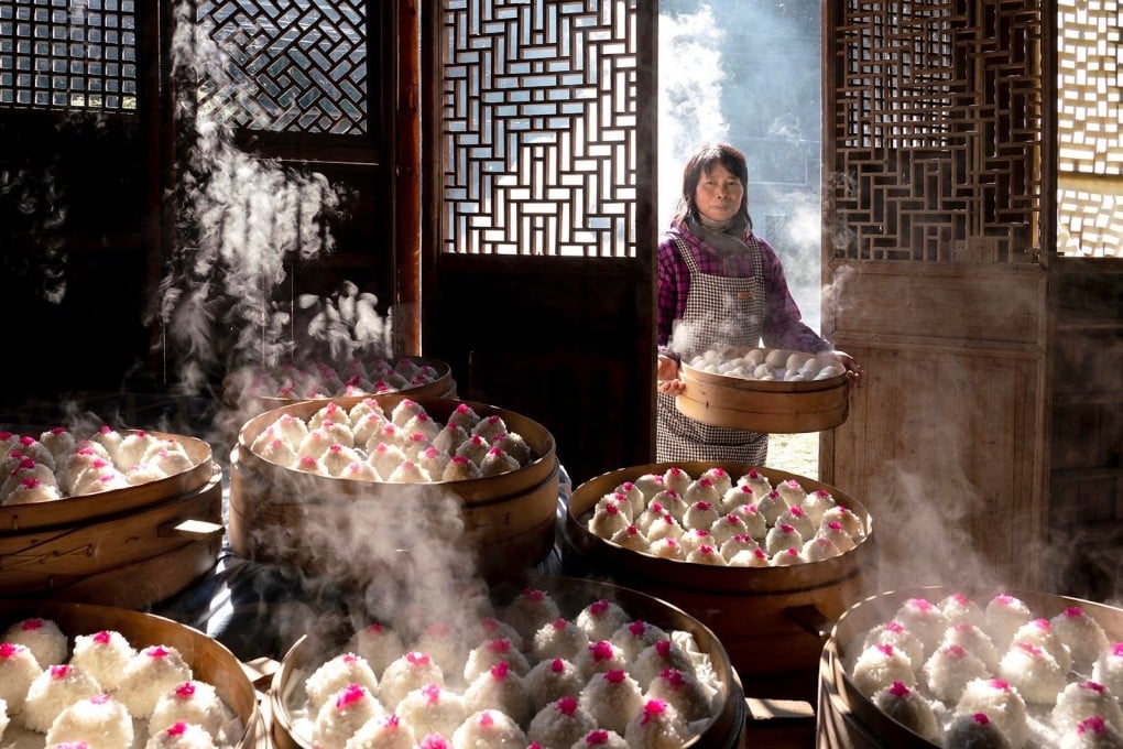 Detail from Zhonghua Yang’s image of a woman preparing steamed dim sum for a Lunar New Year celebration in Xiangshan, Zhejiang province, eastern China which won the overall prize in a global food photography contest. Photo: Zhonghua Yang/Pink Lady