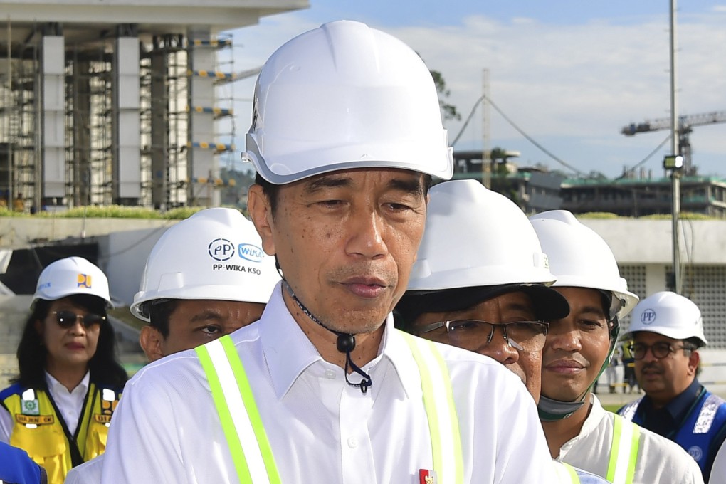 Indonesian President Joko Widodo talks to journalists after he inspected the presidential palace construction site at the new capital city Nusantara on Wednesday. Photo: Indonesian President Palace/AP