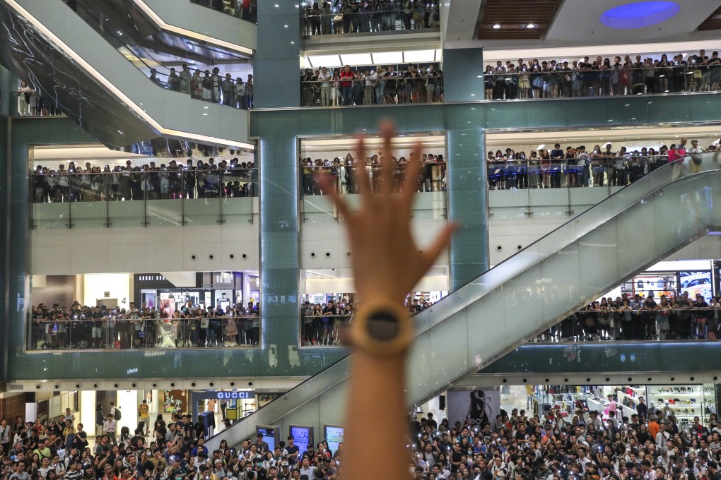 Anti-government protesters gather at the New Town Plaza shopping centre in Sha Tin in 2019. Photo: Sam Tsang