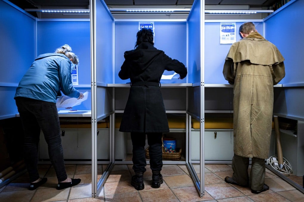 People casting their votes for the European Parliament in Castricum, The Netherlands. Photo: EPA-EFE