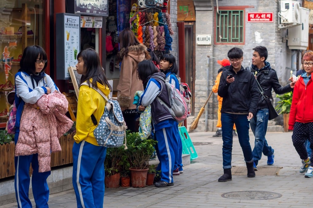 Students leave school in China. Incidents of bullying in schools have prompted calls for stronger laws. Photo: Shutterstock