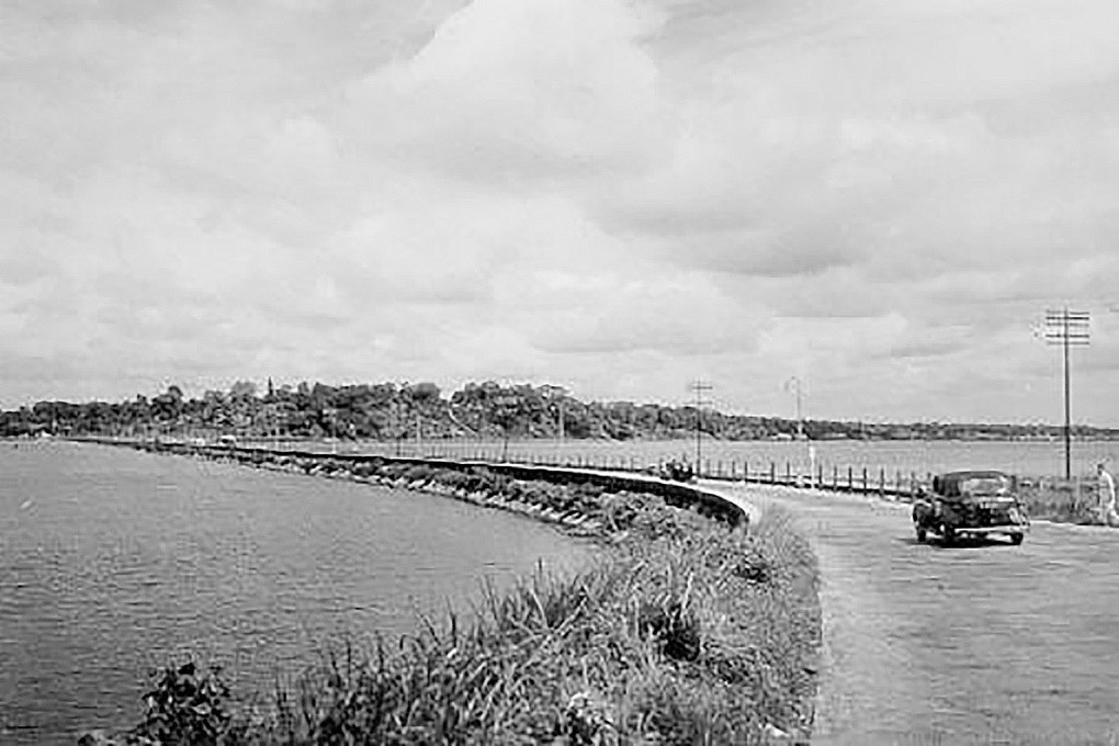 The Johor-Singapore causeway as seen from the Woodlands end in the 1940s. A popular legend involving its construction claims human skulls were incorporated into the foundations to appease evil spirits. Photo: Handout