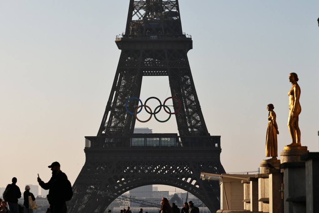 The Olympic rings, unveiled early in the morning on Friday, are displayed on the south side of the 135-year-old Eiffel Tower, overlooking the Seine River. Photo: Xinhua