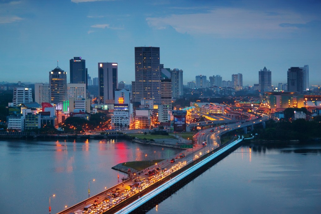 The Malaysian city of Johor Bahru, with heavy traffic seen on the Johor-Singapore Causeway at dusk. Photo: Getty Images