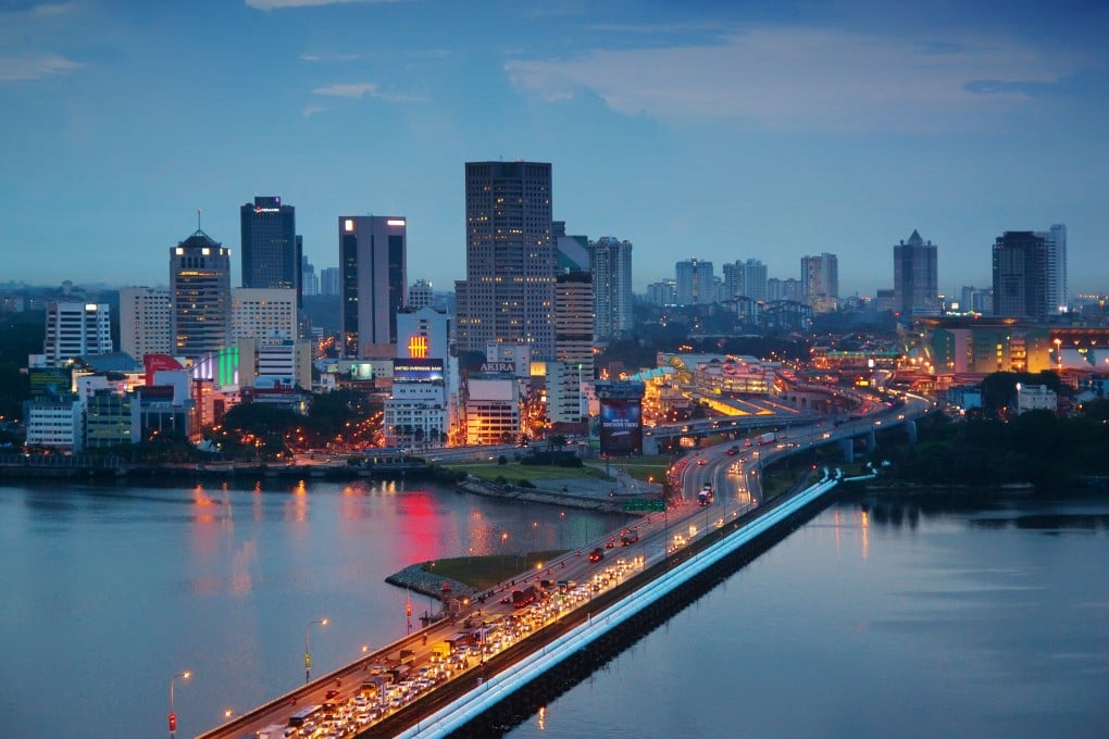 The Malaysian city of Johor Bahru, with heavy traffic seen on the Johor-Singapore Causeway at dusk. Photo: Getty Images