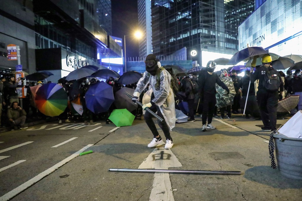 Anti-government protesters barricade a road in Central in 2019. Photo: Sam Tsang