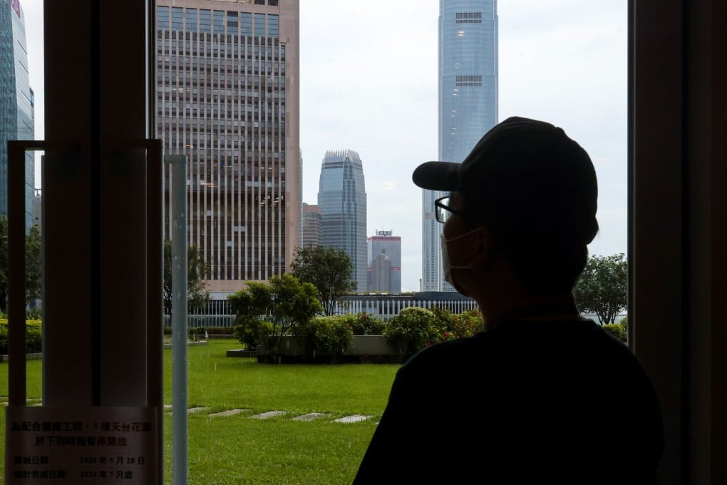 Employer Paul Chan says his helper was left owing HK$120,000 to loan firms and debt collector threw red paint near his home. Photo: Jonathan Wong