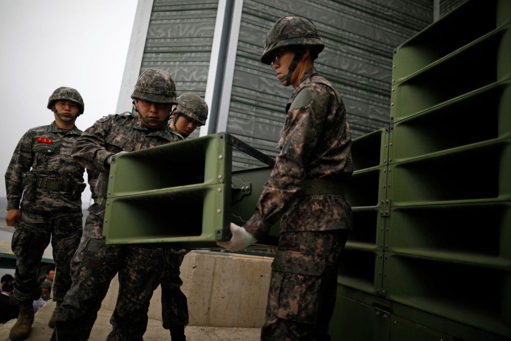 South Korean soldiers dismantle loudspeakers in 2018 that set up for propaganda broadcasts near the Demilitarised Zone separating the two Koreas in Paju, South Korea. Photo: AP