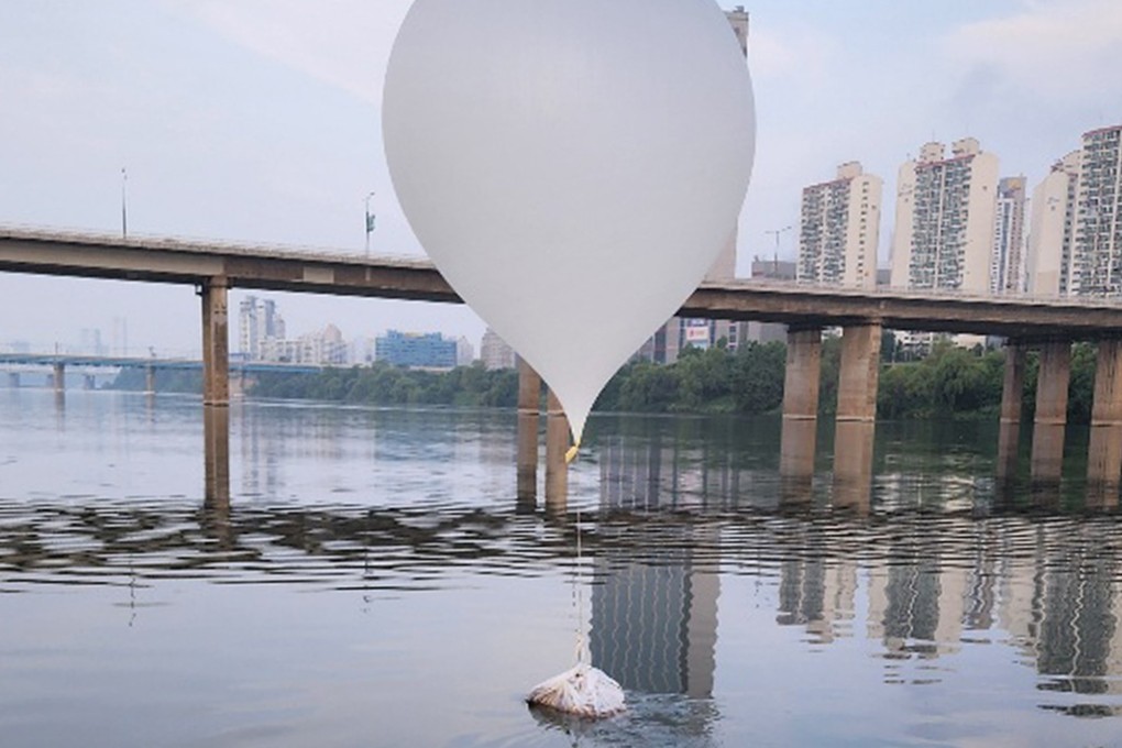 A balloon carrying garbage, presumably sent by North Korea, is seen floating on the Han River in Seoul on Sunday. Photo: South Korea Joint Chiefs of Staff/Handout via EPA-EFE