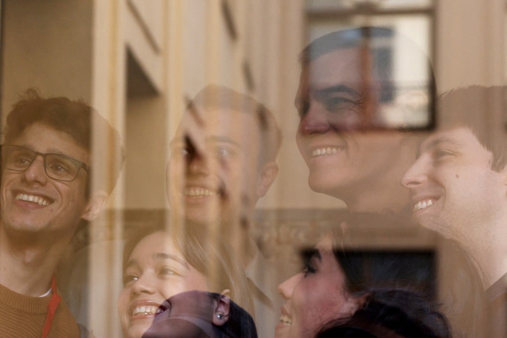 Spain’s Prime Minister Pedro Sanchez poses for a picture with supporters at a polling station. Photo: Reuters