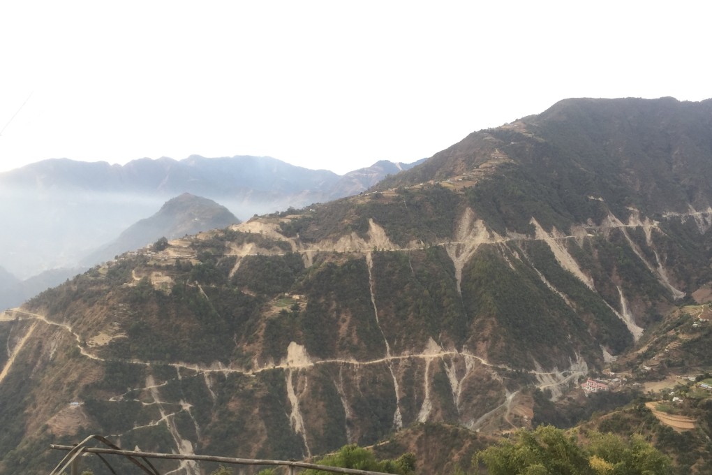 Landslides are seen along the route of a newly constructed highway in Nepal’s Kathmandu Valley. Photo: Prakash Singh Thapa/Handout