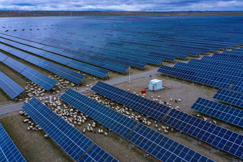 (240609) -- XINING, June 9, 2024 (Xinhua) -- An aerial drone photo taken on June 9, 2022 shows a flock of sheep roaming between solar panels at a solar photovoltaic power plant in Gonghe County, Hainan Tibetan Autonomous Prefecture in northwest China’s Qinghai Province. (Xinhua/Zhang Long)