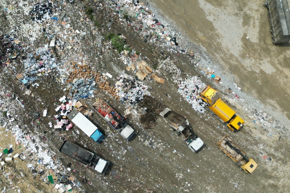 Six men have been charged in connection with the alleged fraudulent dumping of tonnes of construction waste at a Fanling landfill site. Photo: Felix Wong