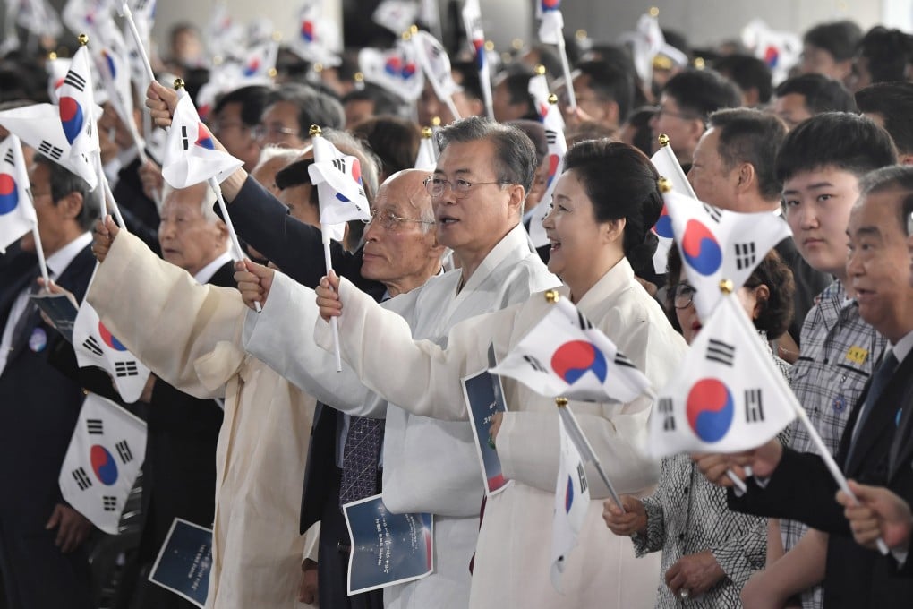 South Korea’s former president Moon Jae-in (middle) and his wife Kim Jung-sook (middle right) attend the 74th anniversary of Korea’s liberation from Japan’s rule, in Cheonan in 2019. Photo: EPA-EFE