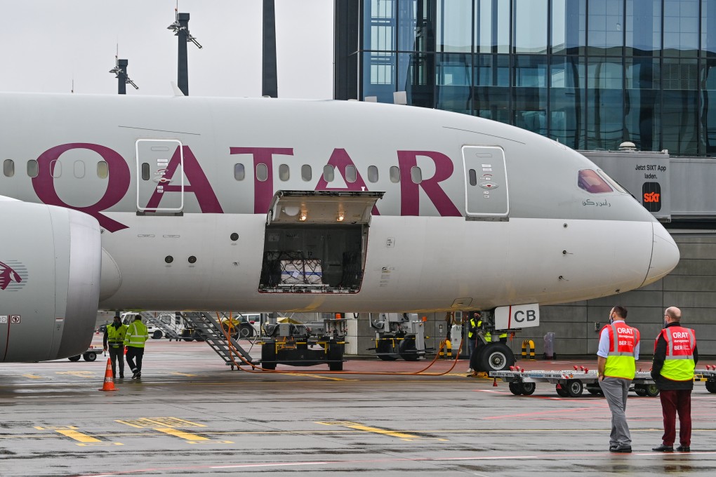 A Boeing 787 (Dreamliner) of Qatar Airways at a gate at the Berlin Airport.  A Qatar Airways flight was delayed in Athens due to a technical issue in intense heat. Photo: dpa