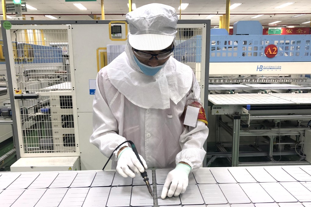 A worker on the production line at a Vinasolar plant in Ho Chi Minh City. Solar equipment manufacturing in Vietnam and other Southeast Asian countries has come under scrutiny amid accusations of Chinese manufacturers moving operations there to dodge US tariffs. Photo: Cissy Zhou
