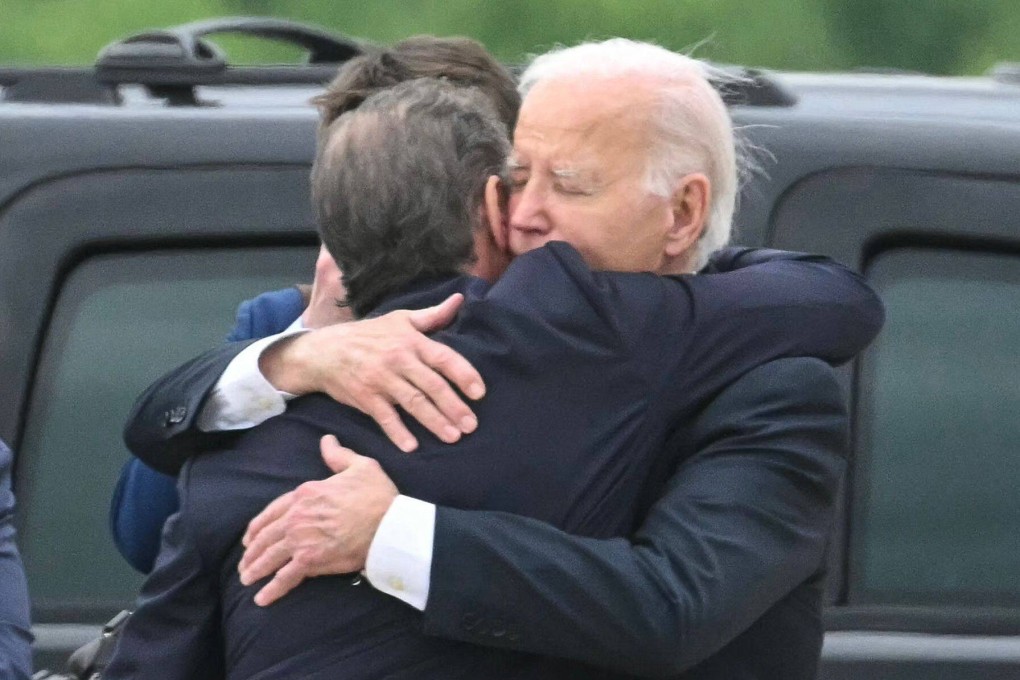 US President Joe Biden hugs his son Hunter Biden at Delaware Air National Guard Base. Photo: AFP