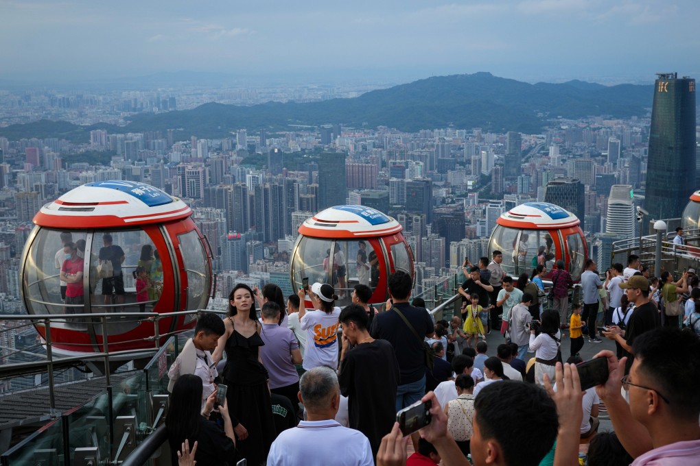 Visitors enjoy the views in Guangzhou. Photo:  Eugene Lee