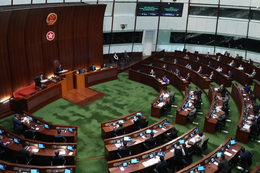 Chief Executive John Lee attends a question and answer session at the legislature. Photo: Sam Tsang