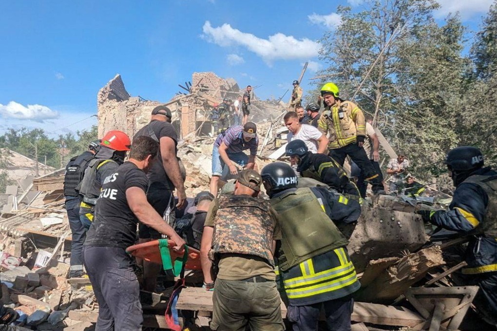 Rescuers working at the site of a missile strike in central Ukraine on Wednesday. Photo: EPA