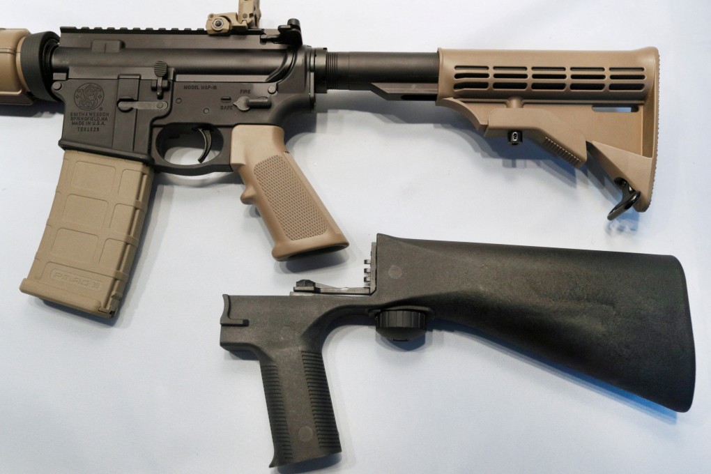 A bump fire stock attaches to a semi-automatic rifle to increase the firing rate. Photo: Reuters