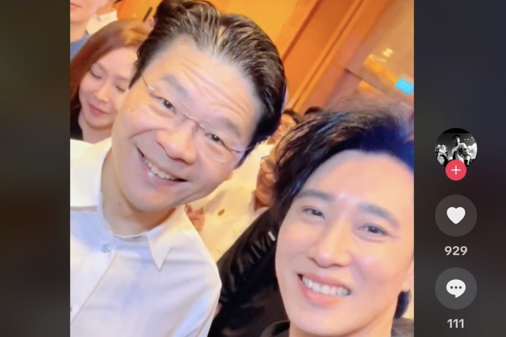 Singapore’s Prime Minister Lawrence Wong and NoonTalk’s co-founder Dasmond Koh posing for a wefie at a People’s Action Party event in Singapore on June 8. Photo: @dasmondkoh/TikTok