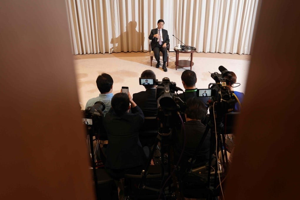 Hong Kong leader John Lee meets the media at his office on Friday. Photo: Eugene Lee