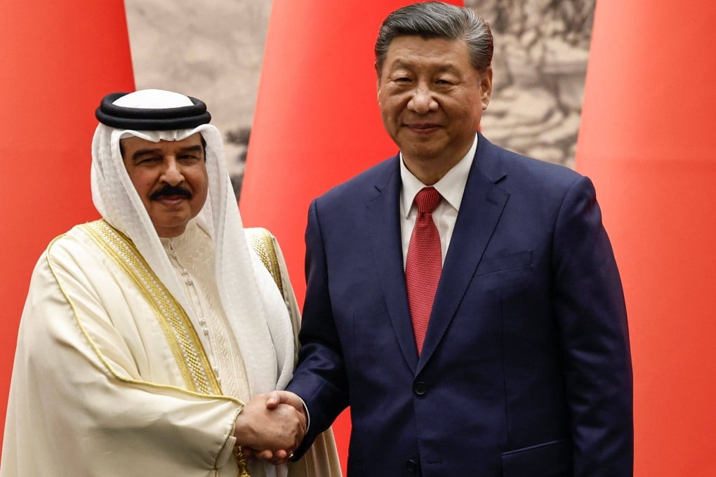 Chinese President Xi Jinping shakes hands with Bahrain’s King Hamad bin Isa al-Khalifa shake hands following a signing ceremony in Beijing on May 31. Photo: AFP