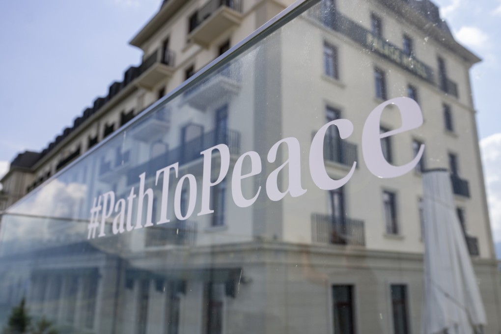 The hashtag #PathToPeace is pasted on the glass panel of a balustrade in front of a resort building as final preparations are done for the “Summit on Peace in Ukraine” in Switzerland. Photo: EPA-EFE