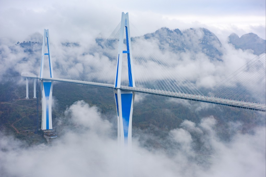 Massive infrastructure projects have contributed to significant levels of “hidden debt” across China. The Pingtang Bridge, seen here in Guizhou province, cost 1.5 billion yuan and opened in 2019. Photo: Xinhua