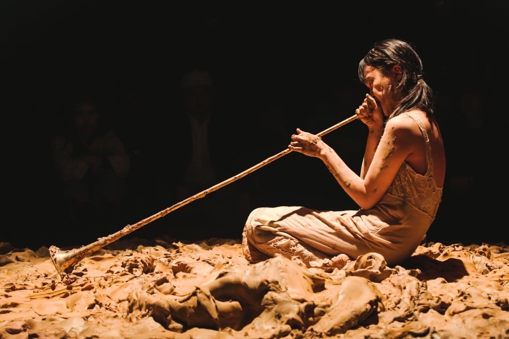 Performance artist Florence Lam performs Nvwa and Her Lost Child (2024) at the Kwai Tsing Theatre’s Black Box Theatre, in Hong Kong. The art form is growing in popularity in the city, with Marina Abramović a likely source of inspiration. Photo: Au Tsz Long / Florence Lam