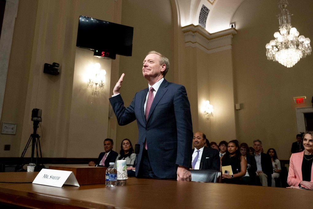 Brad Smith, vice-chairman and president of Microsoft, is sworn in on Capitol Hill in Washington on Thursday. Photo: AFP