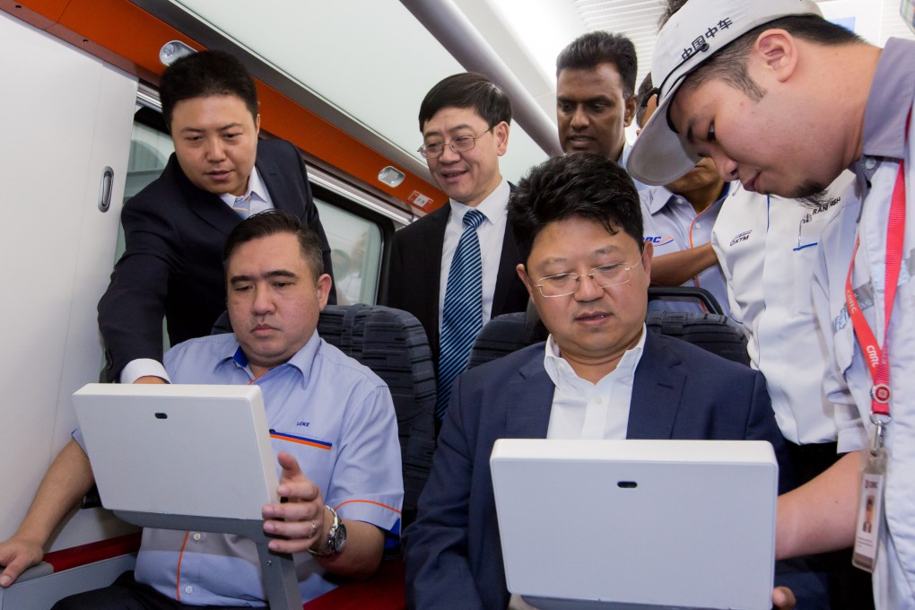 Malaysia’s Transport Minister Anthony Loke (front, left) inspects a train made by Chinese manufacturer CRRC Corp in 2019. Photo: Xinhua
