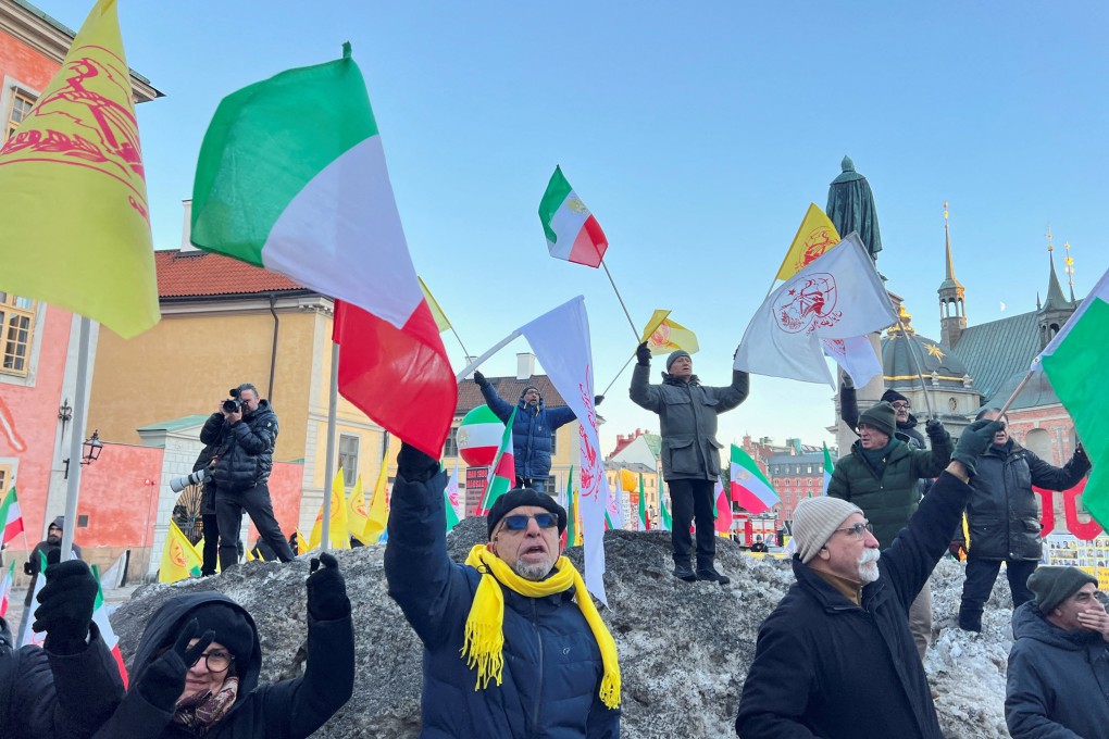 People in Stockholm, Sweden, celebrate the guilty verdict of Iranian Hamid Noury in December. Convicted of being involved in a mass execution of Iranian political prisoners, he is due back in Iran soon, following a prisoner swap. Photo: Reuters