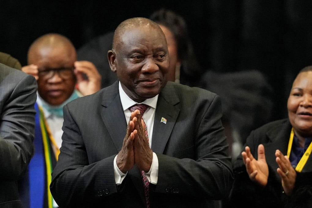 South African leader Cyril Ramaphosa reacts after being re-elected as president in Cape Town on Friday. Photo: Reuters