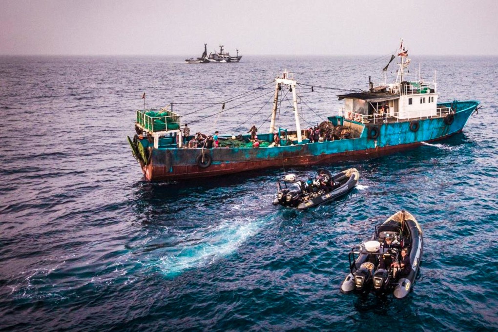 A Chinese-flagged vessel is stopped by coastguards of the coast of Liberia on suspicion of illegal fishing. Photo: Sea Shepherd