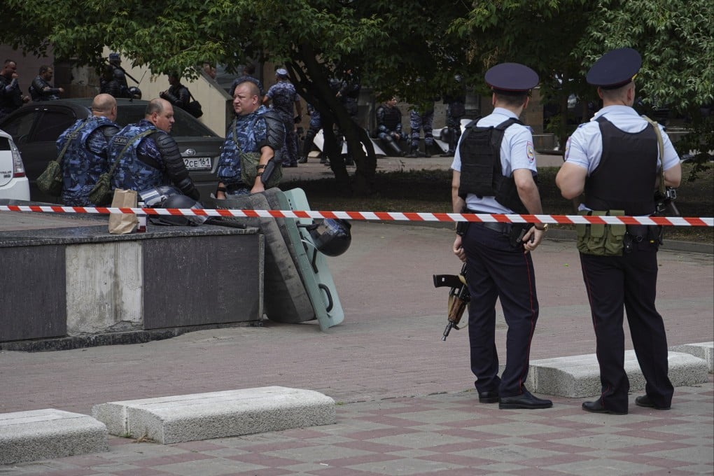 Russian policemen and Rosguardia servicemen gather not far from a pretrial detention centre in Rostov-on-Don, Russia, on Sunday. Photo: AP