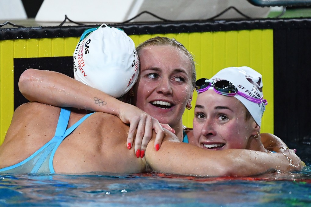 Ariarne Titmus (centre) is among the Australian swimmers urged to ignore the China doping scandal at the Olympics. Photo: EPA