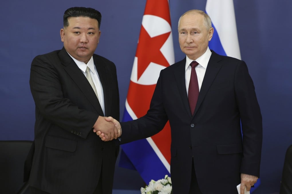 Russian President Vladimir Putin and North Korea’s Kim Jong-un shake hands during a meeting in Russia last year. Photo: AP