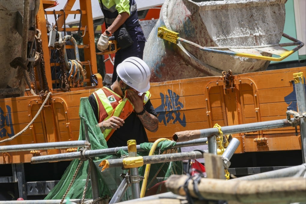 A construction worker mops sweat away as Hong Kong sizzles in high temperatures. Photo: Yik Yeung-man