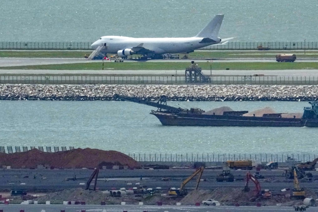A cargo plane burst its tyre during an emergency landing on Monday, which led to an eight-hour runway closure at Hong Kong International Airport. Photo: May Tse