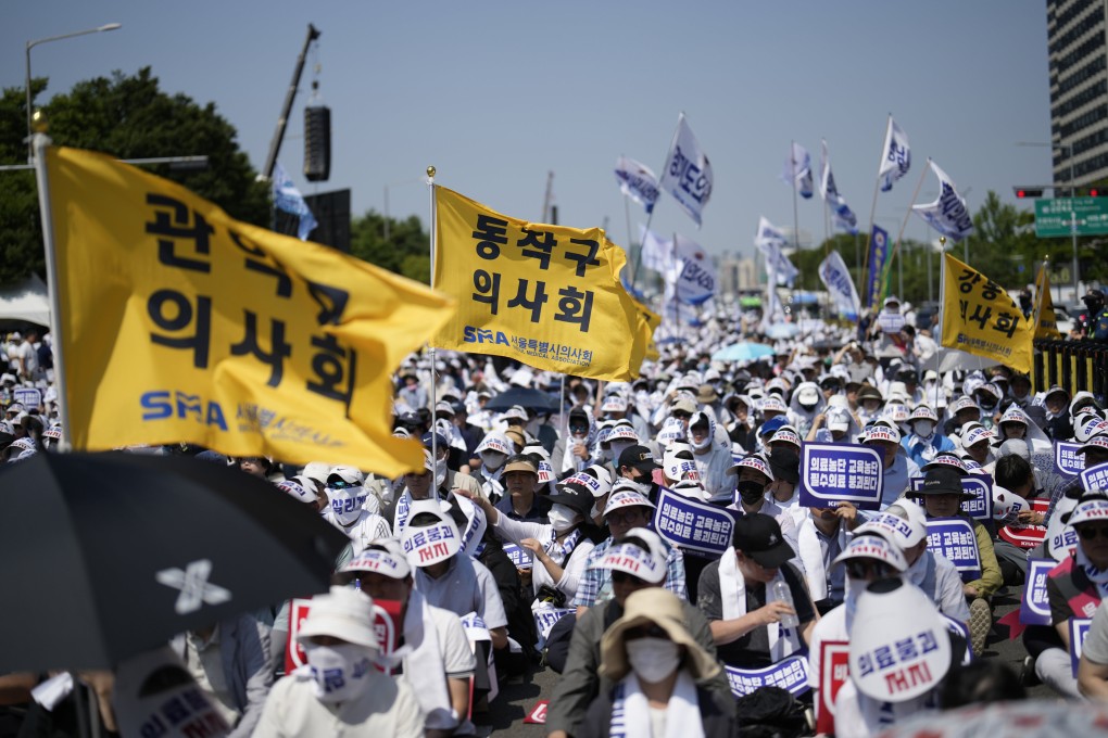 Members of the Korea Medical Association attend a rally in Seoul on Tuesday protesting against the government’s medical policy. Observers warn the months-long doctors’ strike may continue indefinitely. Photo: AP