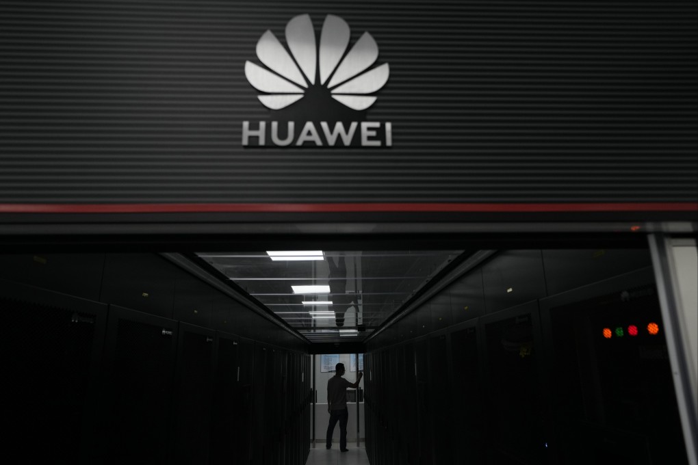 A technician stands at the entrance to a Huawei 5G data server centre at the Guangdong Second Provincial General Hospital in Guangzhou, southern China. Photo: AP