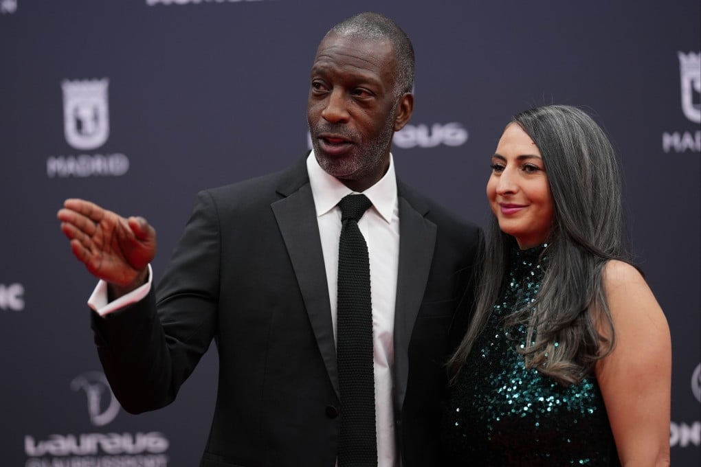 Michael Johnson (with his wife, Armine Shamiryan) is launching a track league with US$12.6m in prize money over its first season. Photo: AP