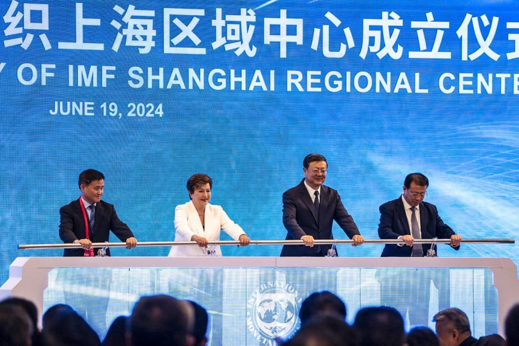 From left to right, PBOC governor Pan Gongsheng, IMF managing director Kristalina Georgieva, Shanghai party secretary Chen Jining, and Shanghai mayor Gong Zheng mark the opening an IMF regional centre in Shanghai on Wednesday during the Lujiazui Forum. Photo: Bloomberg