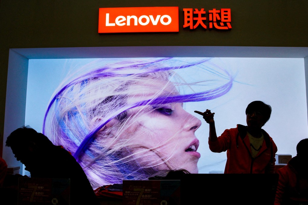An employee gestures next to a Lenovo logo at Lenovo Tech World in Beijing, China November 15, 2019. AI-related stock Lenovo Group jumped 5.6 per cent on Wednesday. Photo: Reuters