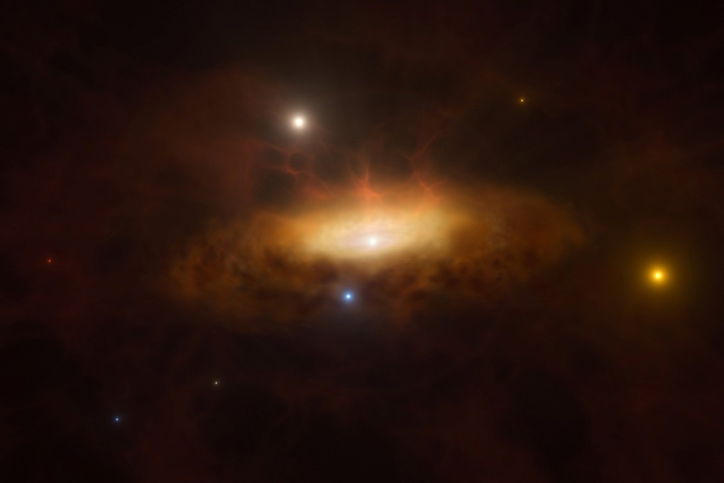 An artist’s impression shows a growing disc of material being pulled in by the black hole as it feeds on the gas available in its surroundings, making the galaxy SDSS1335+0728 light up. Image:  European Southern Observatory/M. Kornmesser via Reuters