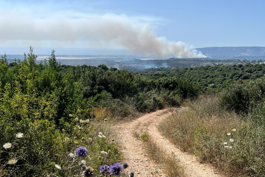 Smoke rises above the Israeli side of the Israel-Lebanon border following attacks from Lebanon. Photo: Reuters